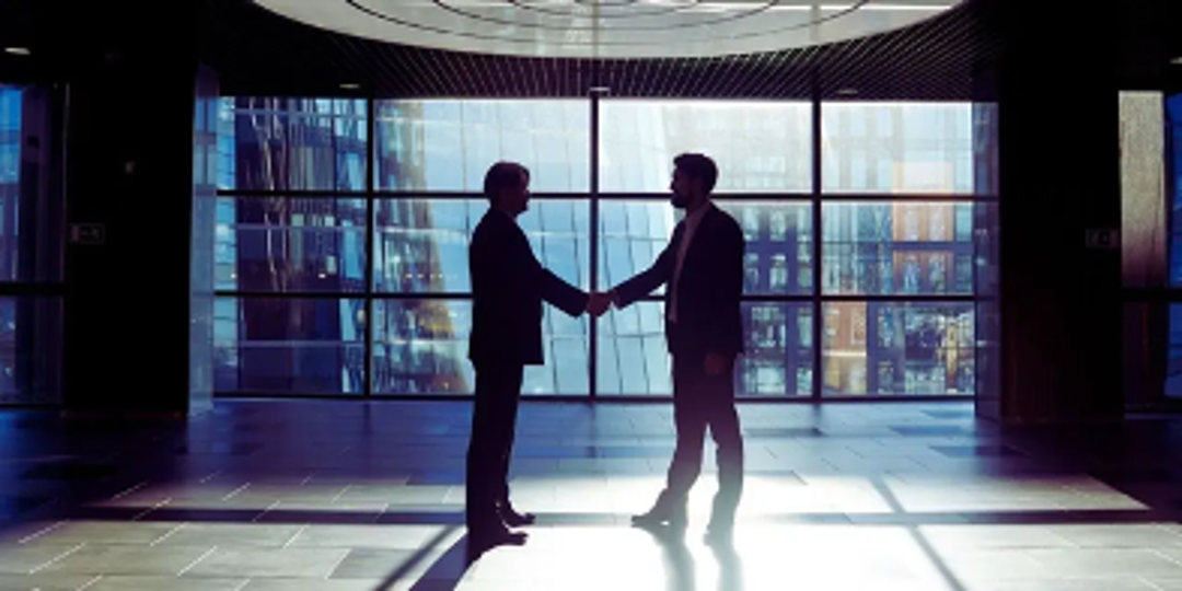 people shaking hands