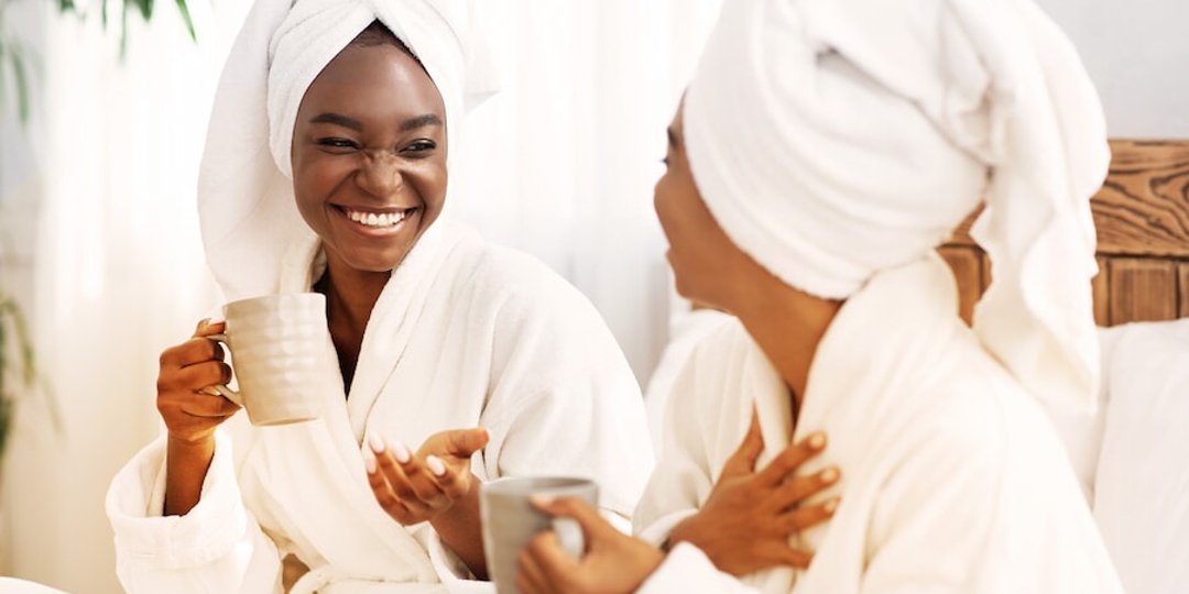 Women drinking coffee in day spa